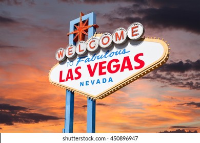 Las Vegas welcome sign with sunrise sky.  