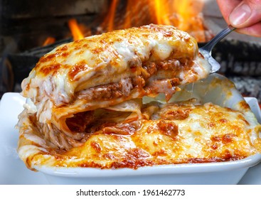 Lasagna Bolognese baked in the wood oven