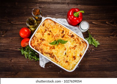 Lasagna On Wooden Table