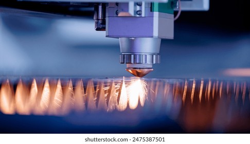 Laser CNC cut of metal with light spark. Blue color background banner, technology modern industrial. - Powered by Shutterstock