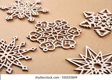 Laser Cut Wood Snowflakes Ornaments.  Wooden Snowflakes On Carton.