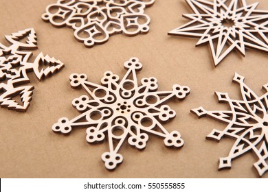 Laser Cut Wood Snowflakes Ornaments.  Wooden Snowflakes On Carton.