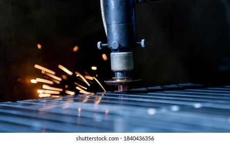 The Laser Cutting Machine Cutting The Holes On Pipes