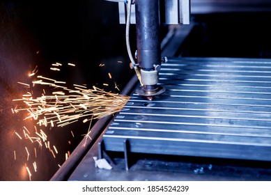 The Laser Cutting Machine Cutting The Holes On Pipes