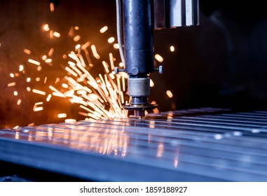 The Laser Cutting Machine Cutting The Holes On Pipes