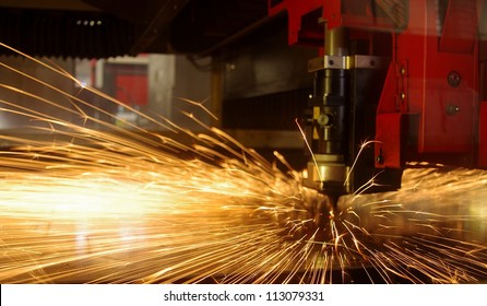 Laser cutting of metal sheet with sparks