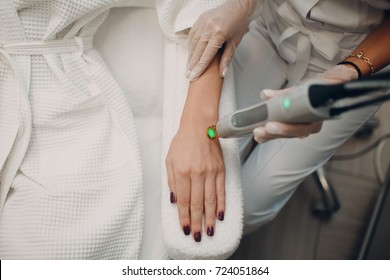 Laser Epilation And Cosmetology. Hair Removal Cosmetology Procedure. Laser Epilation And Cosmetology. Cosmetology And SPA Concept.