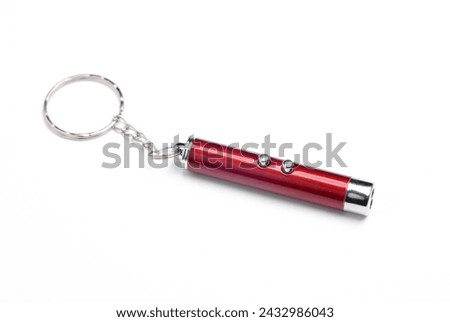 Laser pointer flashlight on white background