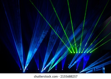 Laser Show Beams. Many Colorful Rgb Lazer Light Beams At A Concert Or A Rave Party Show. Night Club Flyer Design Background