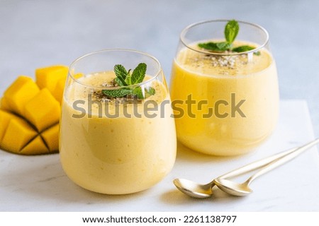 Lassi, mango refreshing drink, indian traditional cocktail, selective focus