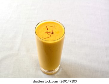 Lassi is a sweet Indian drink, consisting of beaten yogurt. This is a mango flavoured lassi.