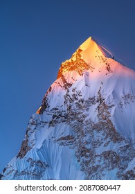 last golden light on the snow peak in Himalaya in Nepal