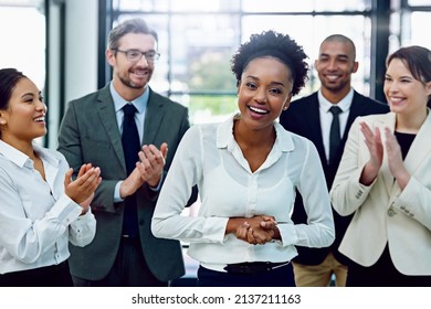 At Last, Her Moment To Shine. Portrait Of A Succesful Businesswoman Being Applauded By Her Colleagues In The Office.