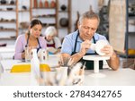 last and important touch is application of paint on finished pottery