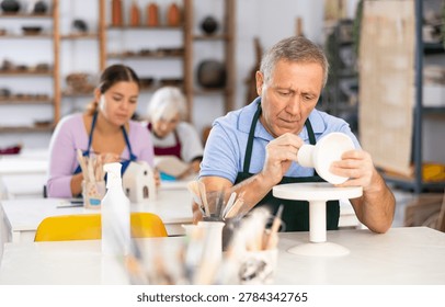 last and important touch is application of paint on finished pottery