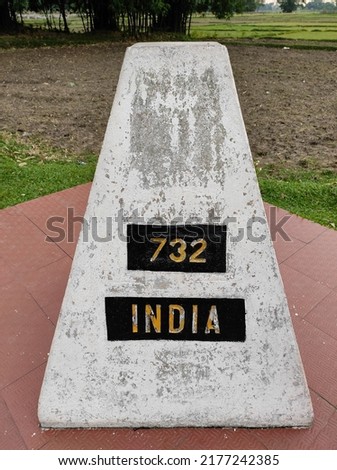 The last mile stone kept at the border between Indian and Bangladesh in the open Bengal border near Assam and Sundarbans.