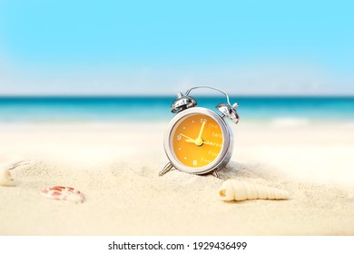 Last Minute To Count Down For Travel Or Travel Vacation Concept. Metaphor By Old Retro Clock On Sand Beach.