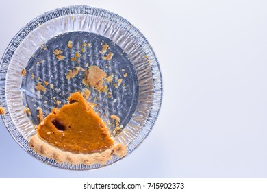 Last Piece Of Pumpkin Pie In Tin With Room For Text