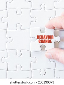 Last Puzzle Piece With Words  BEHAVIOR CHANGE. Concept Image