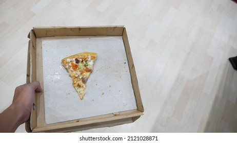 The Last Slice Of Pizza In The Box