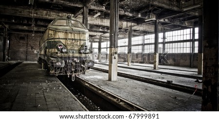 Last stop... This train never leaves this station again. Left behind at an old abandoned train workshop.