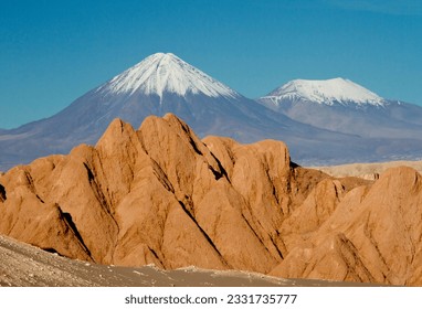Last sunset in the Altiplano; Layers, sand dune and rock, Valle de la Luna; Chile; Flamingo scenic; Major highway; Bolivia; High point pan American highway from Chile to Uraguay; Bolivian Altiplano; H