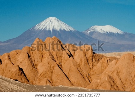 Last sunset in the Altiplano; Layers, sand dune and rock, Valle de la Luna; Chile; Flamingo scenic; Major highway; Bolivia; High point pan American highway from Chile to Uraguay; Bolivian Altiplano; H