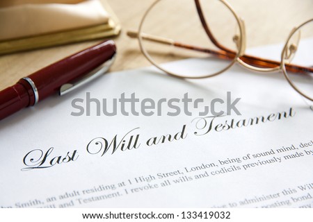 Last Will and Testament concept image complete with spectacles and pen.