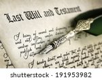 Last Will and Testament document with quill pen and handwriting