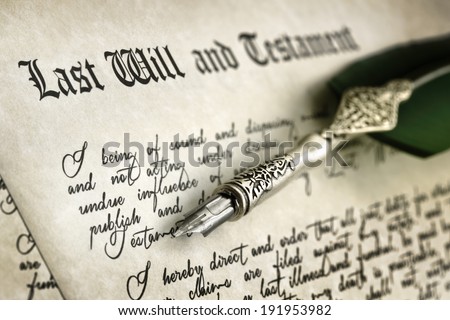 Last Will and Testament document with quill pen and handwriting