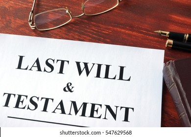Last Will & Testament form on a table.