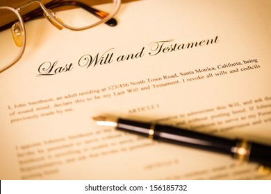 Last will and testament with pen and glasses concept for legal document