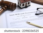 Last will and testament with pen on white table, closeup