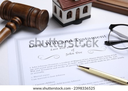 Last will and testament with pen on white table, closeup