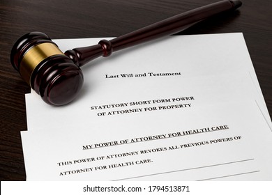 Last Will And Testament, Power Of Attorney, And Health Care Power Of Attorney Forms With Gavel. Concept Of Planning For Death And Estate Planning