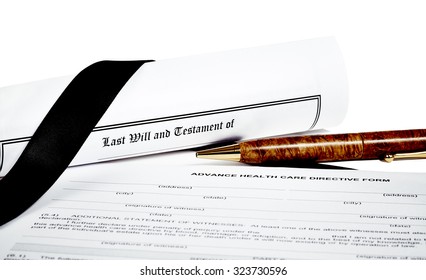 Last Will And Testament Rolled Up With Pen Isoated On White With A Black Ribbon And Advance Health Care Directive