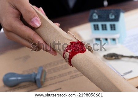 Lastwill Inheritance document Contract is approved by Lawyer to seal wax and stamp approval to finance and separate asset by justice law notary. They allocate insurance money real estate. copy space