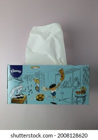 Lat Famous Artist Illustrations Featured On Special Edition Kleenex Tissue Box. White 2 Ply Tissues Made Of Virgin Fiber And Natural Cotton Extract. Blue Box. Pink Background. Malaysia. July 2021