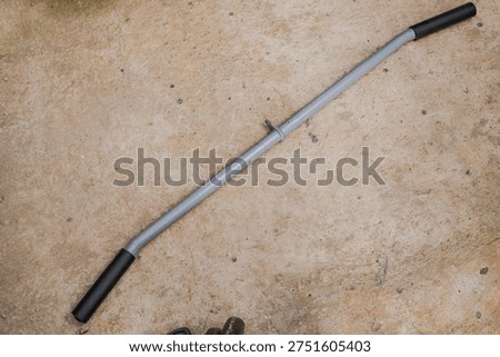 Lat pulldown bar with grips.