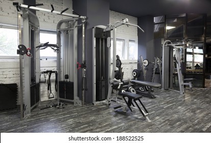 Lat pulldown machine in modern gym