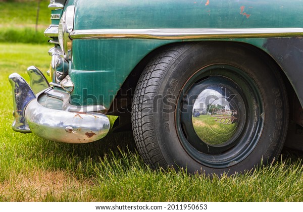 Latah, Washington,
USA. May 24, 2021. Front end and wheel of a vintage Plymouth Super
De Luxe automobile.