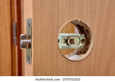 Latch assembly is inserted into door hole during installation.