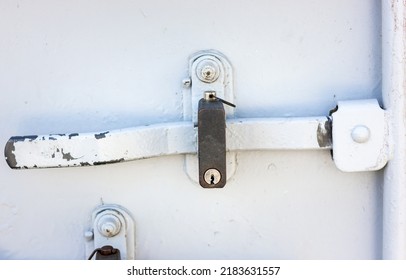 Latch On Iron Doors. Padlocked Doors. Container Iron Gate.