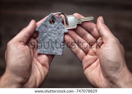 Latchkey in both hands