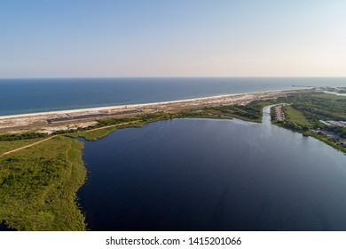 Late afternoon aerial view of Gulf Shores, Alabama - Shutterstock ID 1415201066