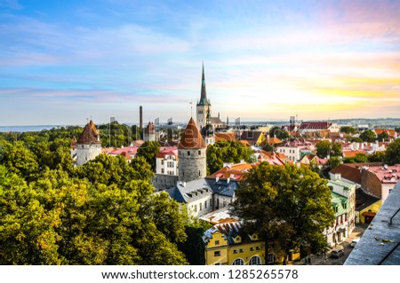 Late afternoon sunset view overlooking the medieval walled city of Tallinn Estonia on an early autumn day in the Baltics region of Northern Europe.