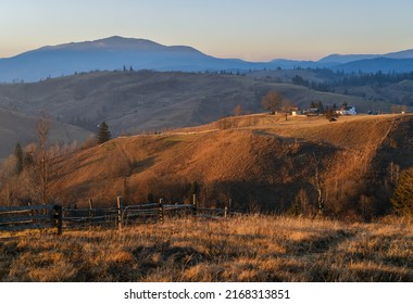 Late autumn mountain countyside sunset scene. Picturesque traveling, seasonal, nature and countryside beauty concept scene. Carpathians, Ukraine. - Shutterstock ID 2168313851