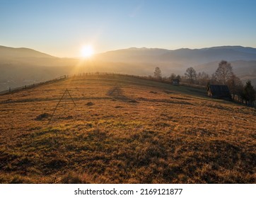 Late autumn mountain countyside sunset scene. Picturesque traveling, seasonal, nature and countryside beauty concept scene. Carpathians, Ukraine. - Shutterstock ID 2169121877