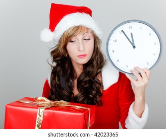 Late Christmas Shopping Girl With Santa Clause Hat