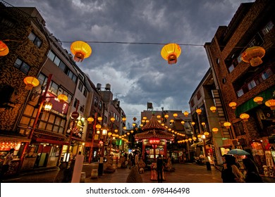 Late evening in one of the streets of Yokohama Chinatown, one of the busiest touristic areas of Japan. The Chinese characters mean "chinatown"